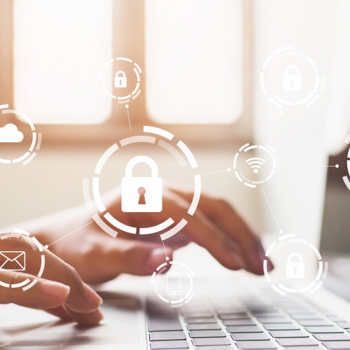 Businessman working on laptop. Protection network security computer and safe your data concept. Digital crime by an anonymous hacker Businessman working on laptop. Protection network security computer and safe your data concept. Digital crime by an anonymous hacker